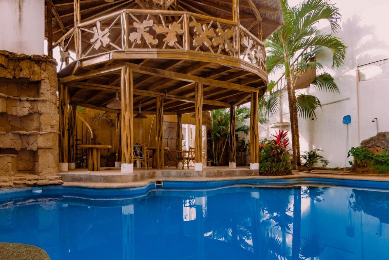 Hostal Poseidon Puerto Cayo Esterno foto