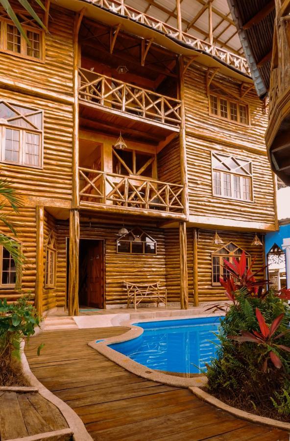 Hostal Poseidon Puerto Cayo Esterno foto