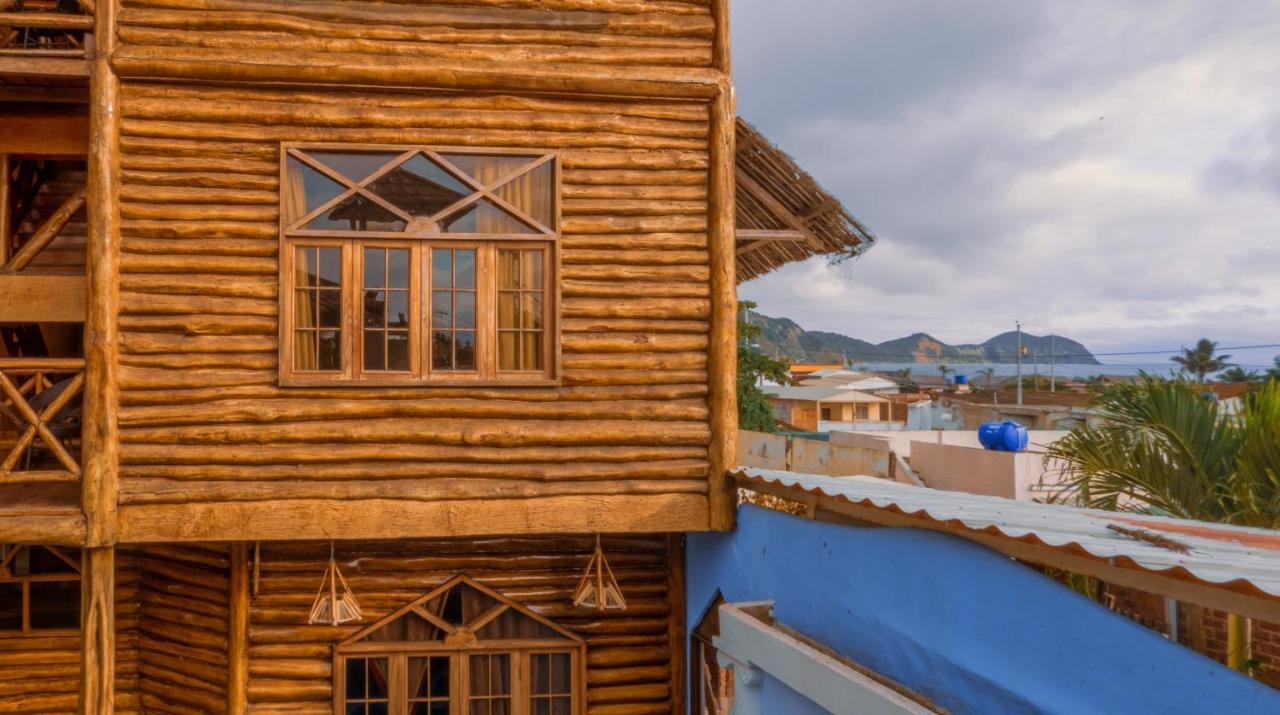 Hostal Poseidon Puerto Cayo Esterno foto