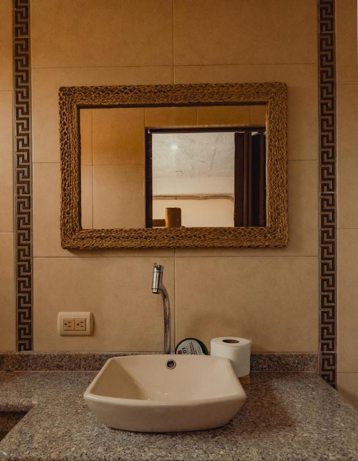 Hostal Poseidon Puerto Cayo Esterno foto