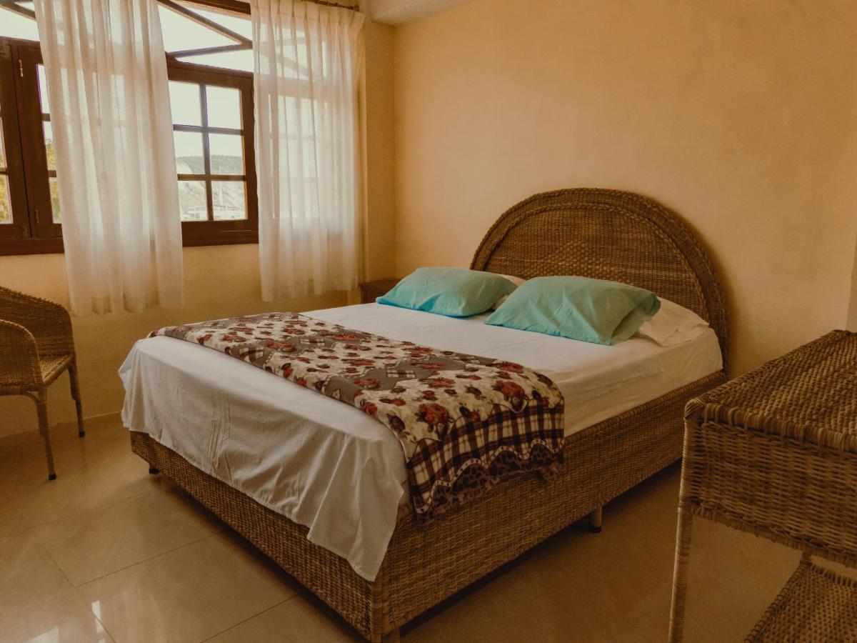 Hostal Poseidon Puerto Cayo Esterno foto