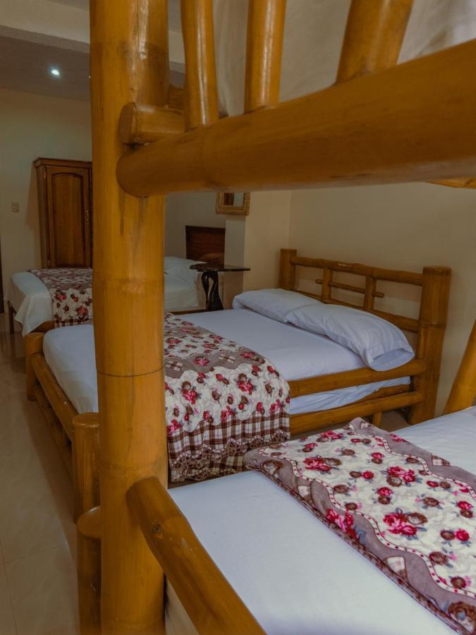 Hostal Poseidon Puerto Cayo Esterno foto