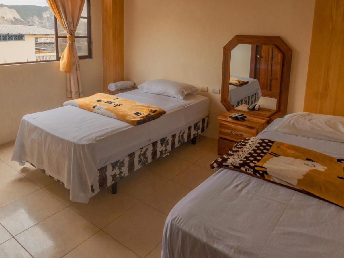 Hostal Poseidon Puerto Cayo Esterno foto