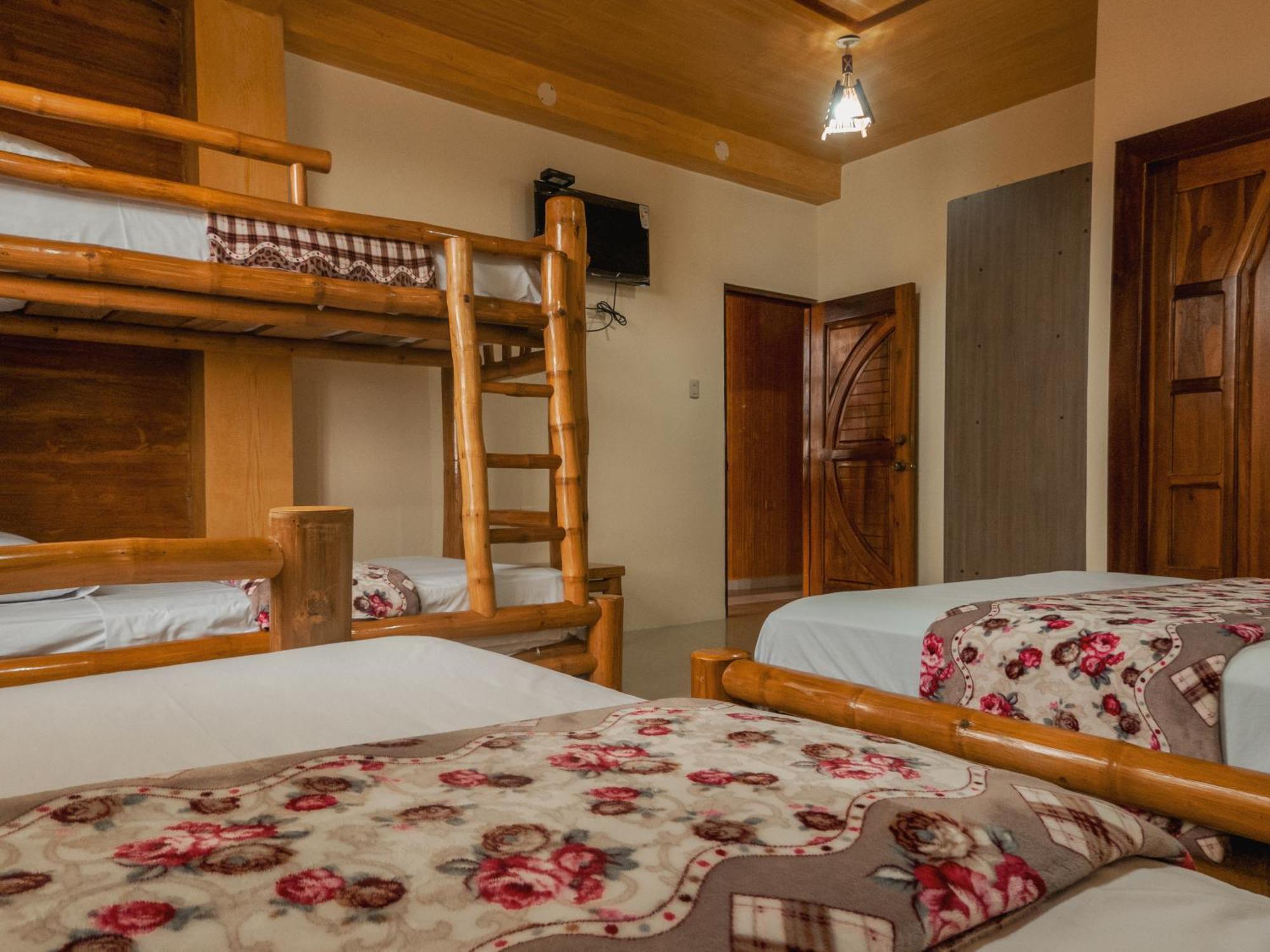 Hostal Poseidon Puerto Cayo Esterno foto