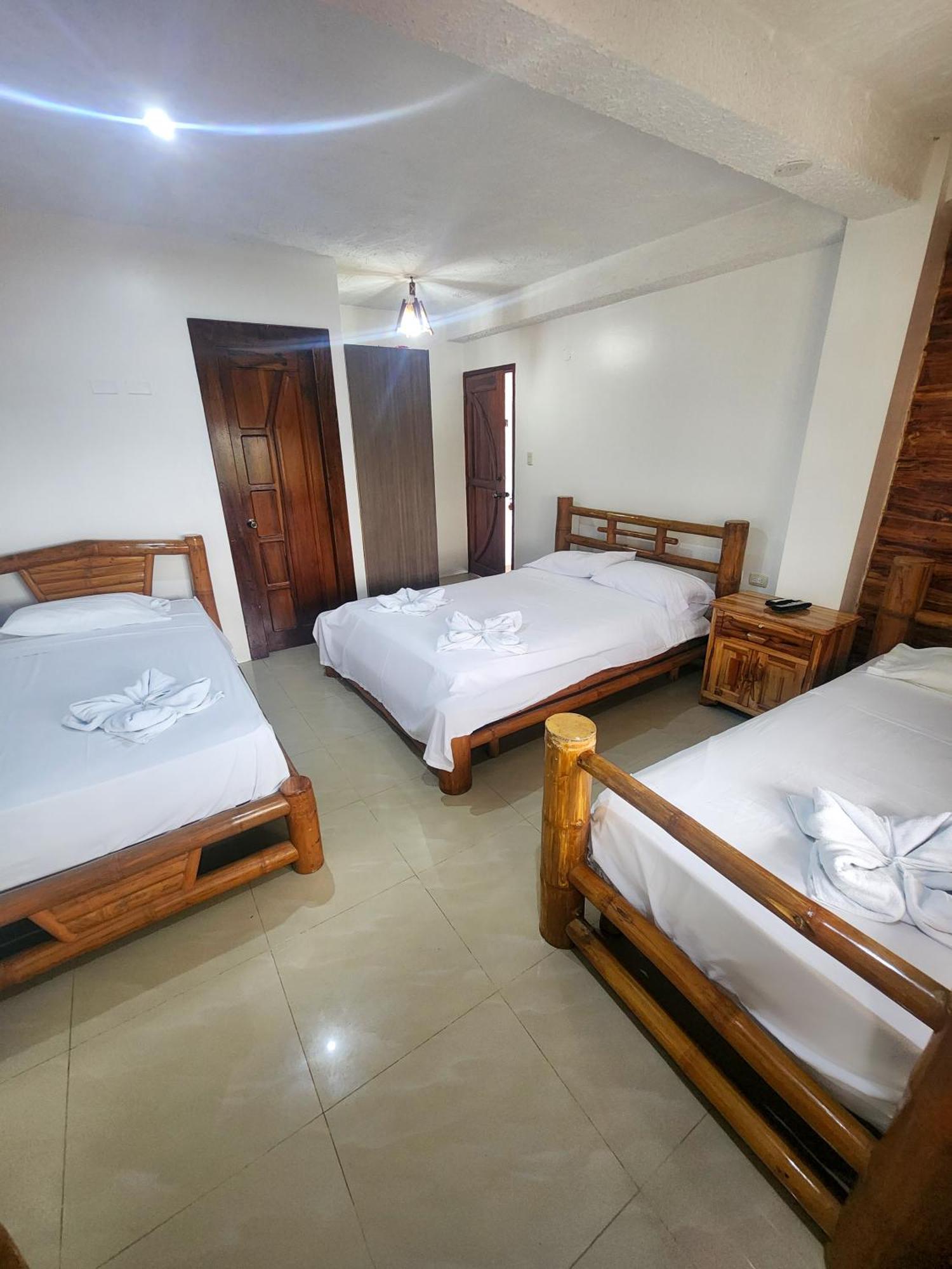 Hostal Poseidon Puerto Cayo Esterno foto