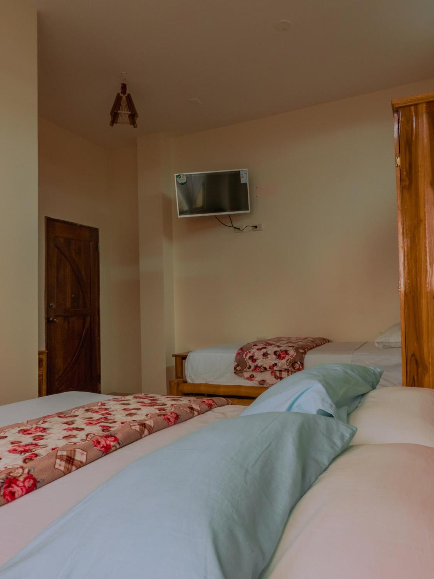 Hostal Poseidon Puerto Cayo Esterno foto