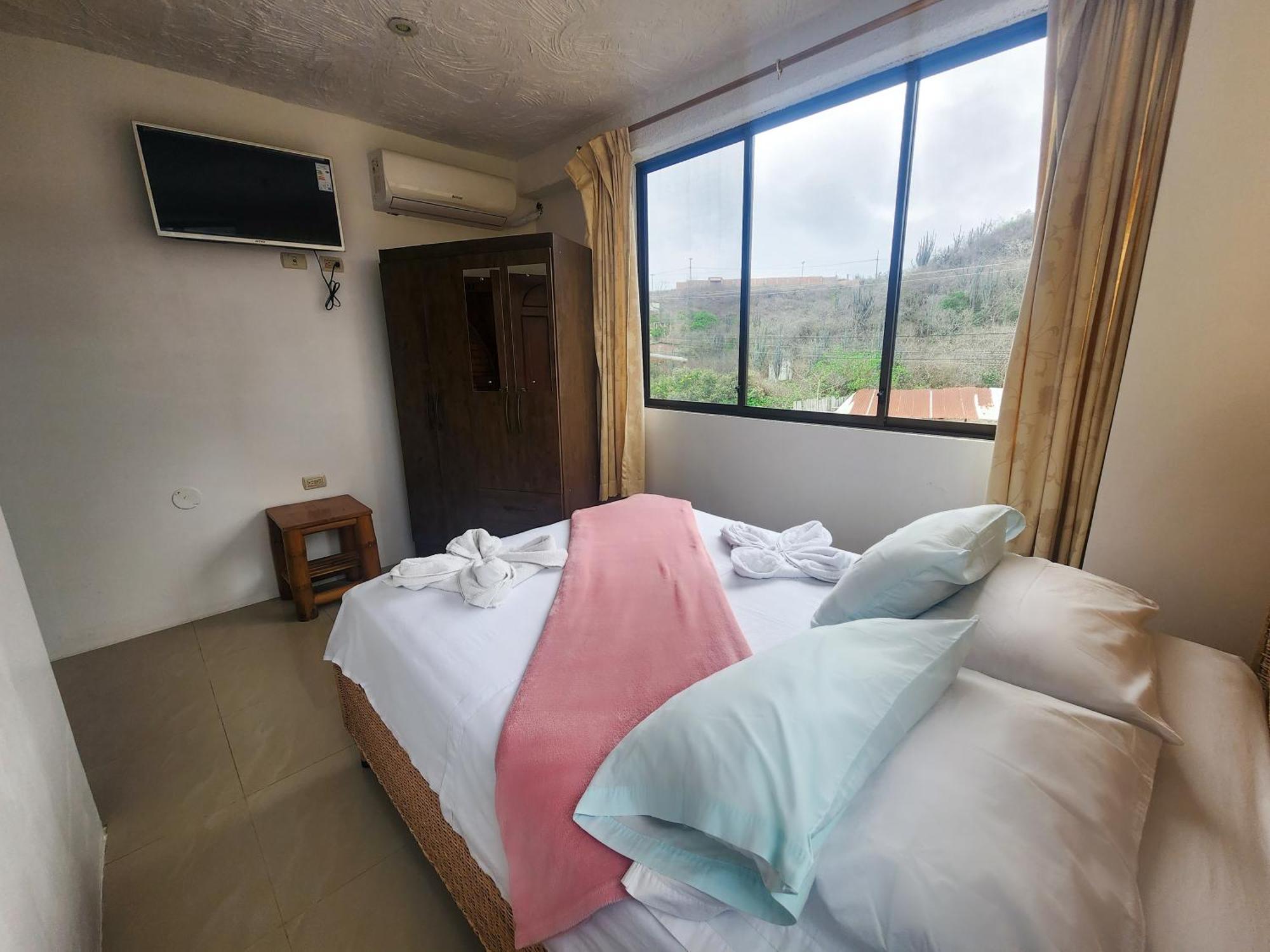 Hostal Poseidon Puerto Cayo Esterno foto