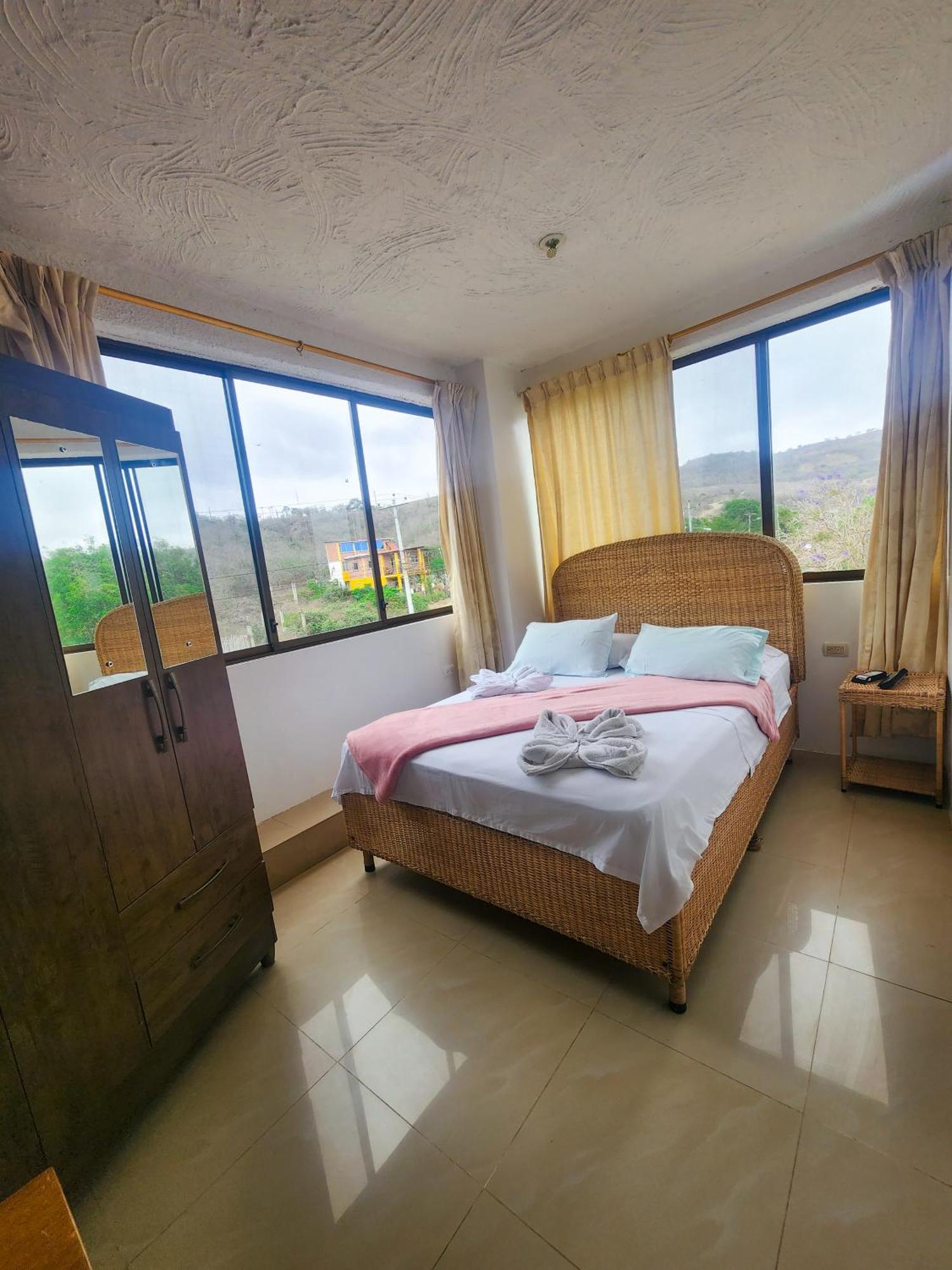 Hostal Poseidon Puerto Cayo Esterno foto