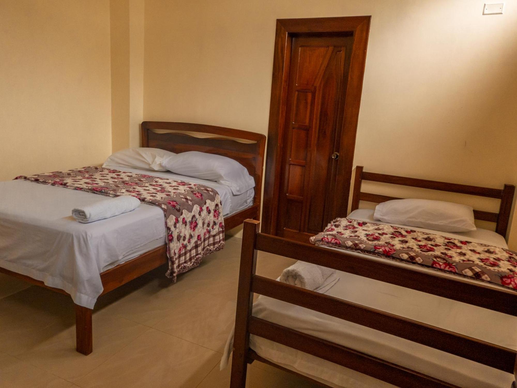 Hostal Poseidon Puerto Cayo Esterno foto