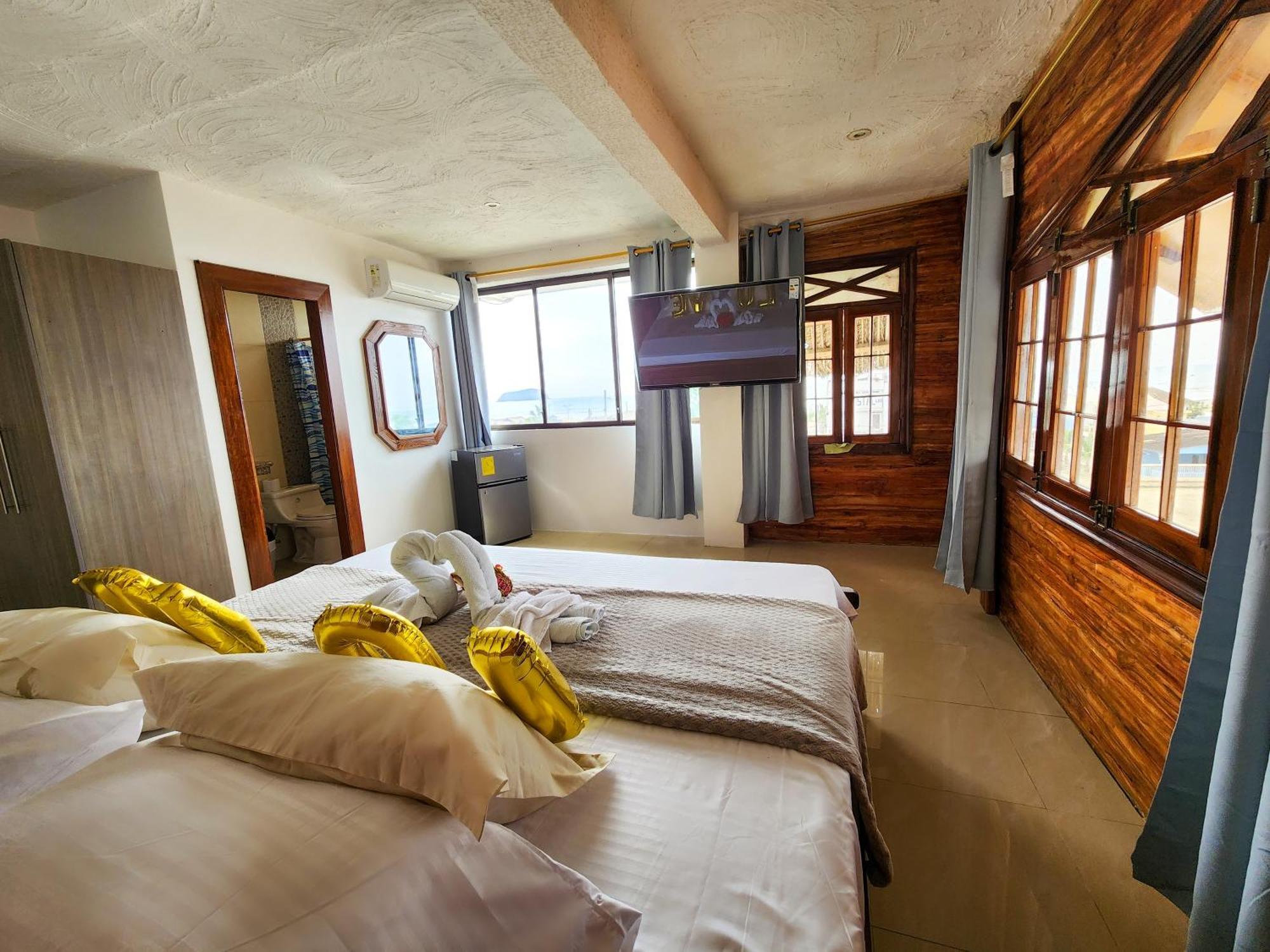 Hostal Poseidon Puerto Cayo Esterno foto